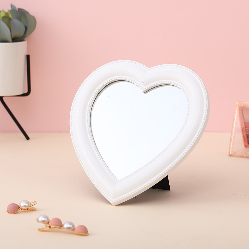 Stylish heart-shaped mirror