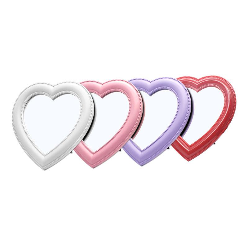 Heart-shaped mirror in various colors